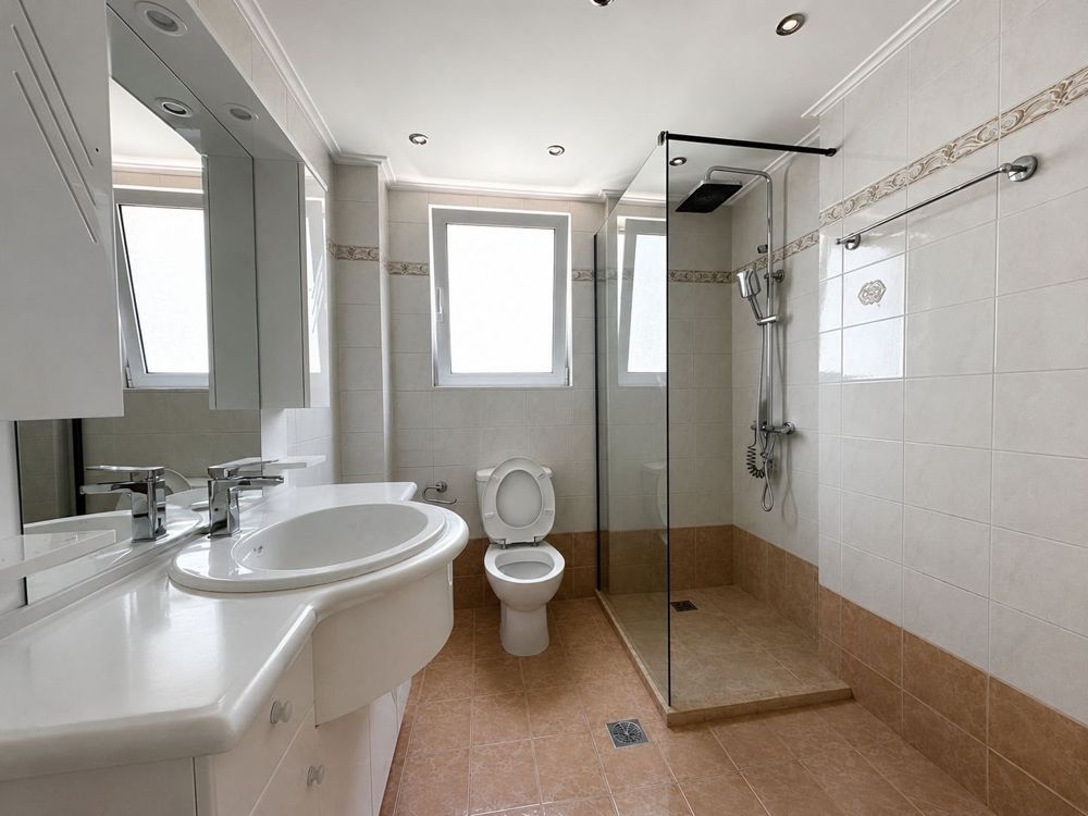 Bathroom with walk-in rain shower