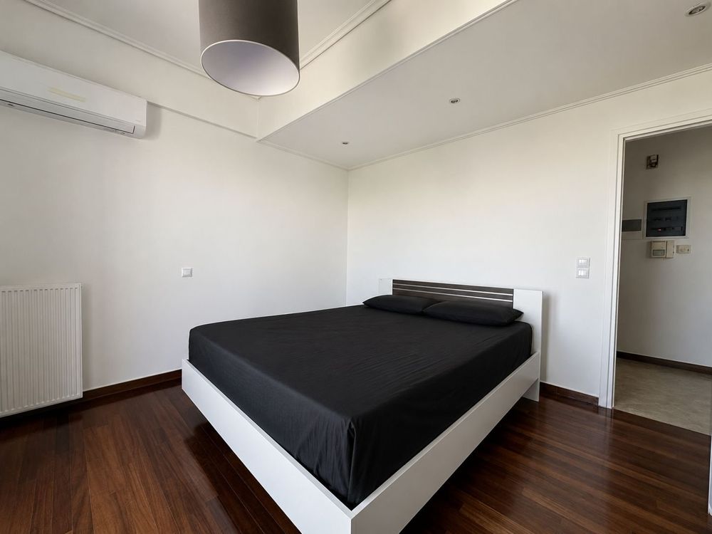 Second double bedroom with wooden floor